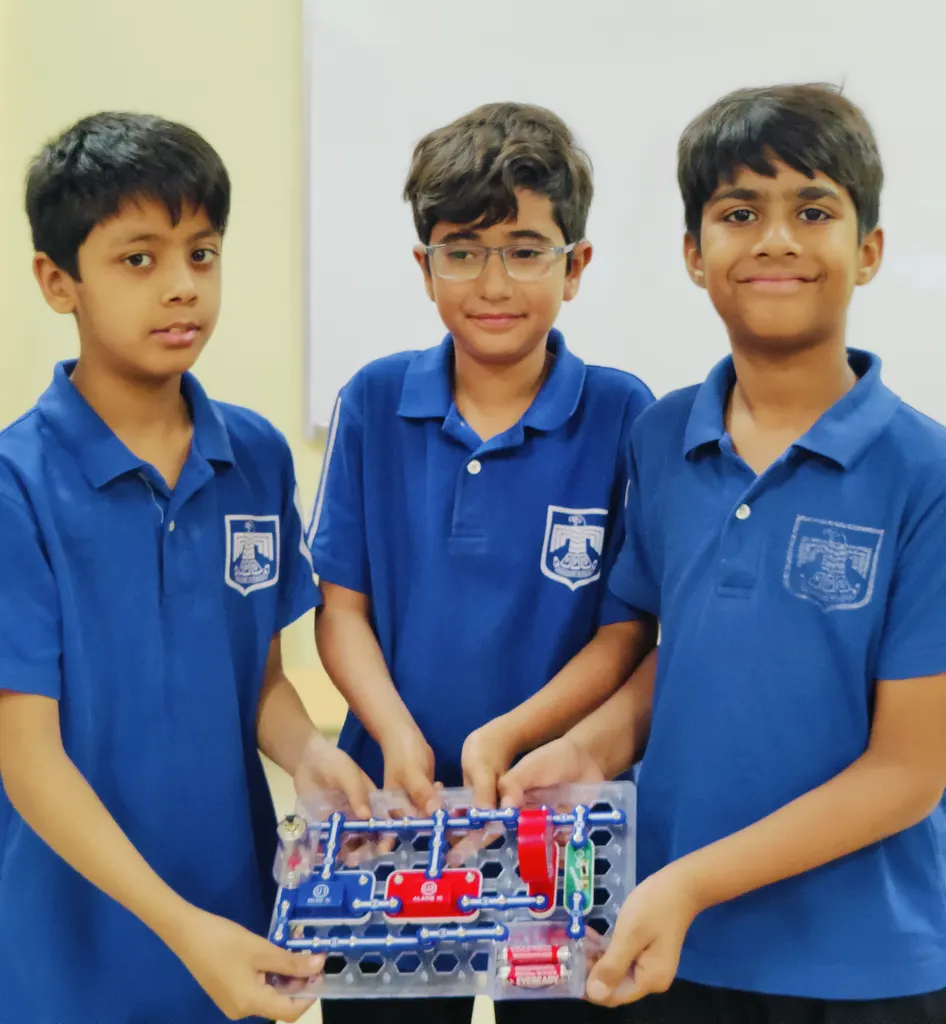 Students building functional alarm circuit system